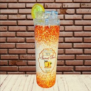 20 ounce insulated Tumbler with Tumbler topper and metal straw.